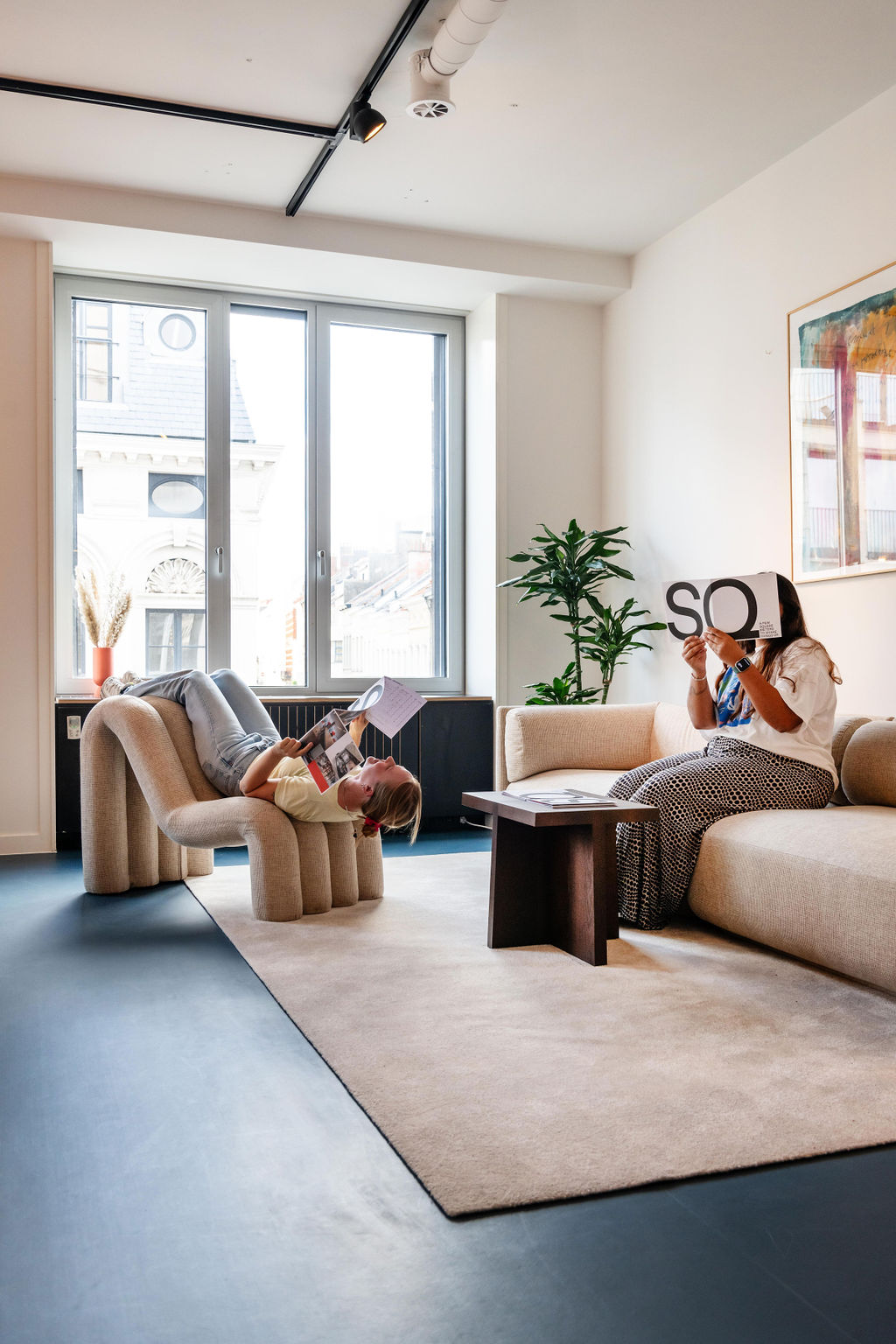Members relaxing in a minimalist Silversquare lounge